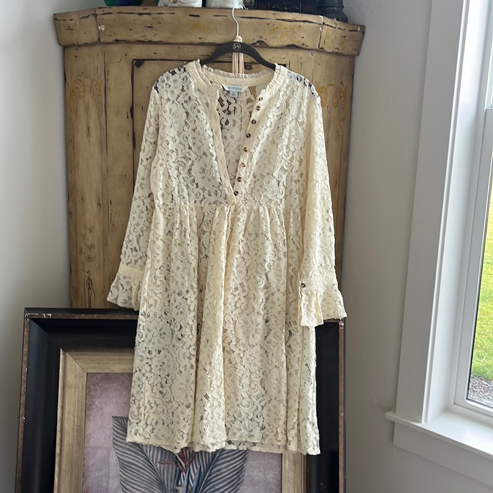 Sundance beautiful lace dress with bell sleeves. Great for any season